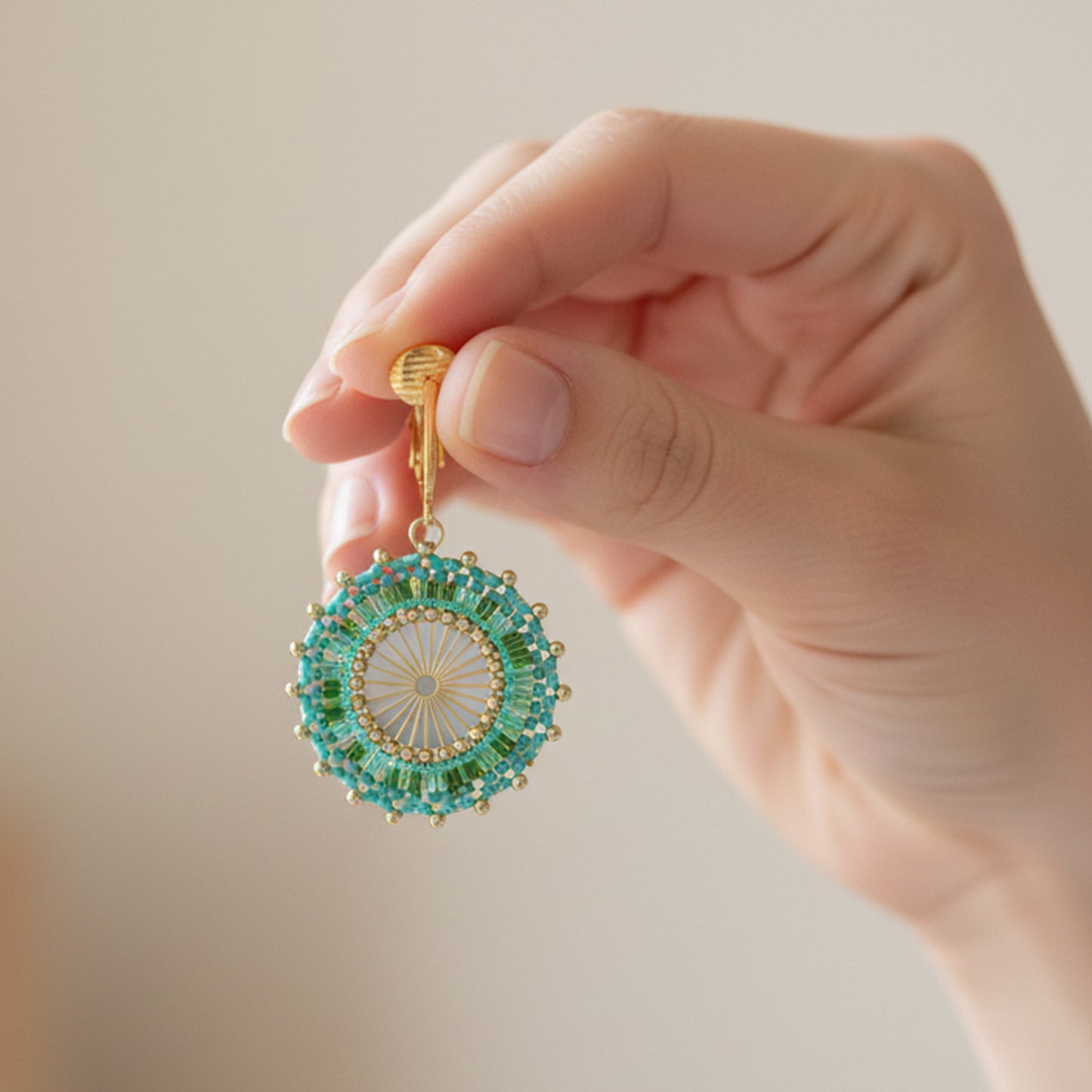 Gold Beaded Circle Clip On Dangling Earrings