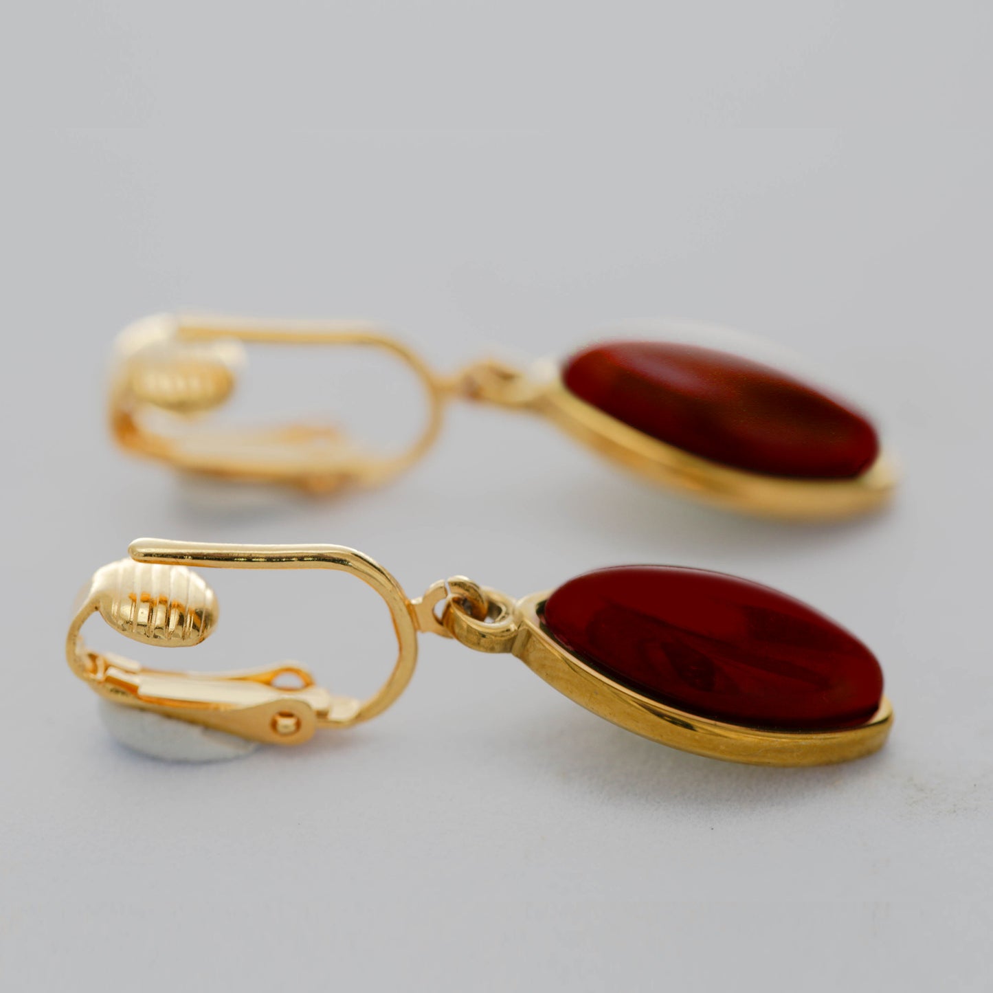 Gold Marquise Shaped Clip On Dangling Earrings