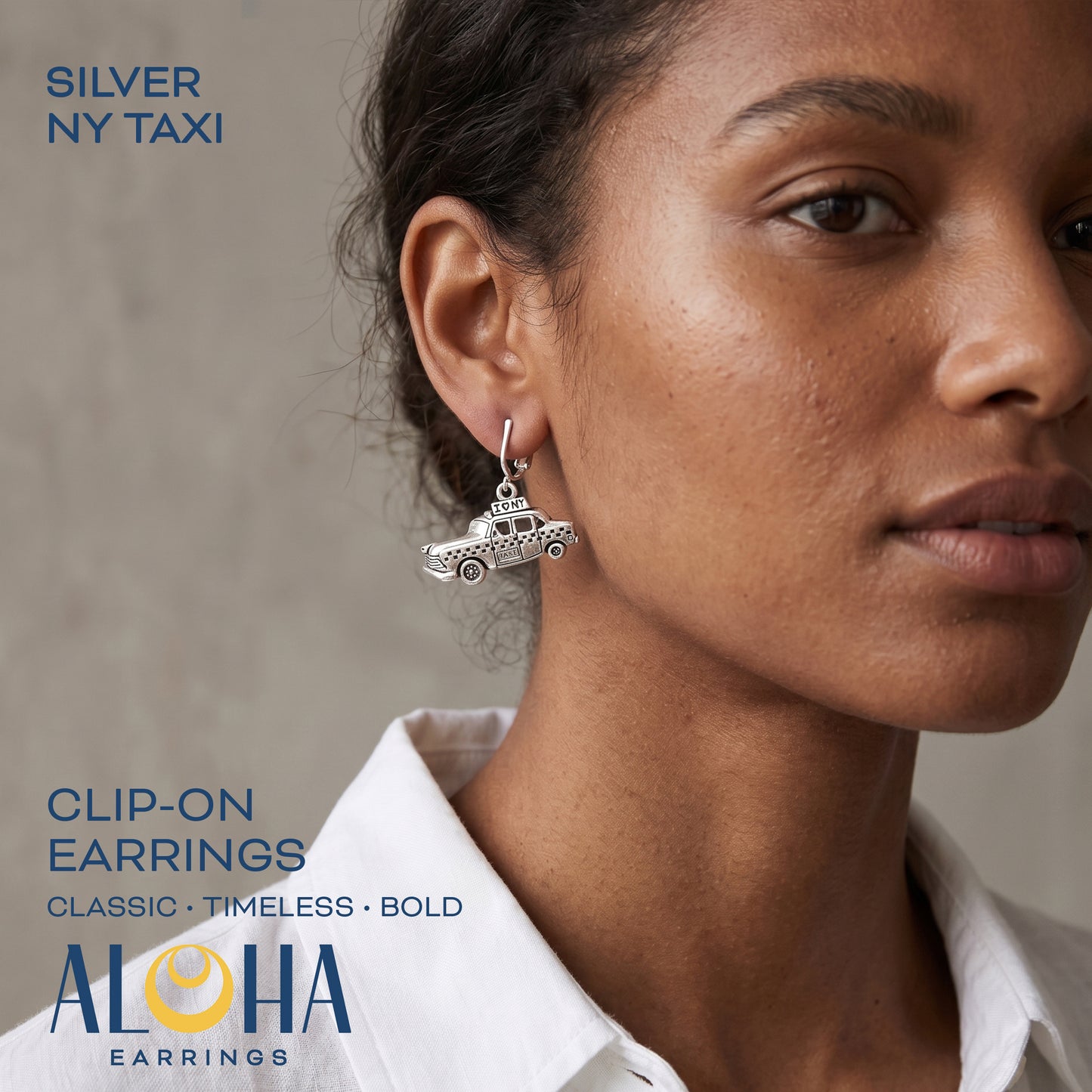 Silver Taxi Clip On Dangling Earrings