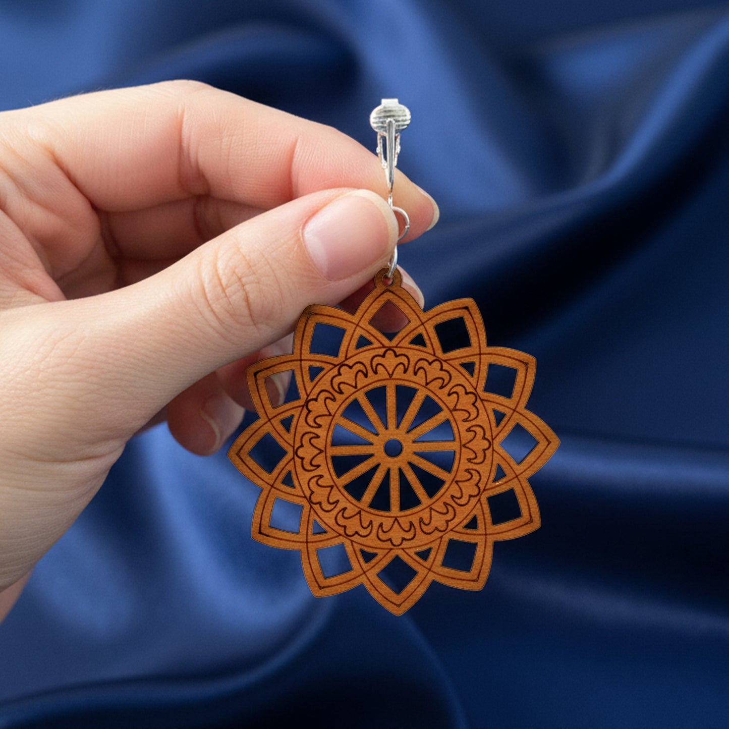 Silver Wooden Sunburst Cutouts Clip On Dangling Earrings